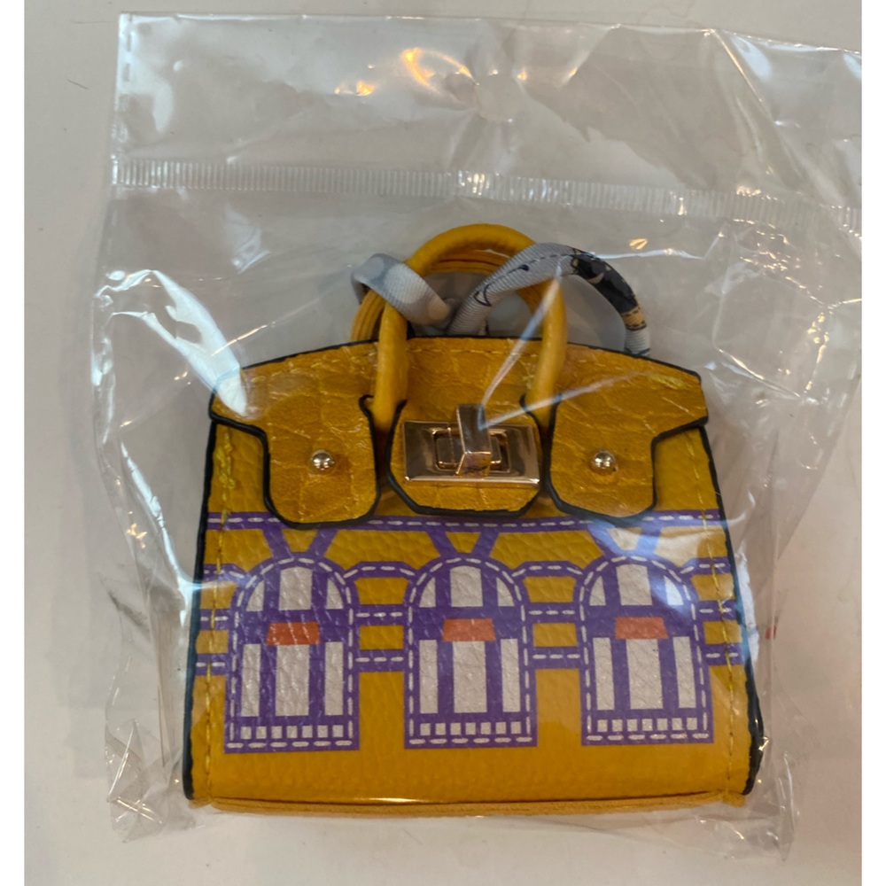 Francesca’s collections Mini yellow House birkin Bag Charm w/ turn lock closure